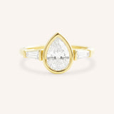 Grannis Three Stone Pear and Baguette Diamond Engagement Ring