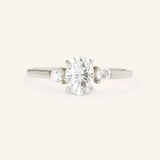 Blushing Bride Oval Three Stone Moissanite Engagement Ring