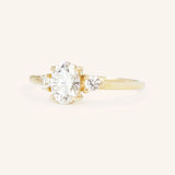 Blushing Bride Oval Three Stone Moissanite Engagement Ring