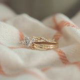 Blushing Bride Oval Three Stone Moissanite Engagement Ring