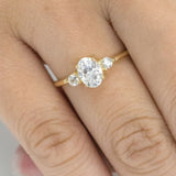 Blushing Bride Oval Three Stone Moissanite Engagement Ring