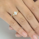 Blushing Bride Oval Three Stone Moissanite Engagement Ring