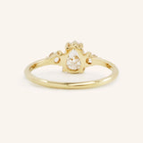 Blushing Bride Moissanite Pear Three Stone Engagement Ring