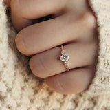Blushing Bride Moissanite Pear Three Stone Engagement Ring