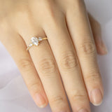Blushing Bride Moissanite Pear Three Stone Engagement Ring
