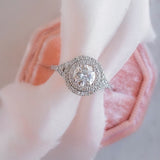 Akin to Crossing Paths Round Moissanite and Diamond Engagement Ring