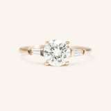 Stately Manor Round Moissanite Tapered Baguette Three Stone Engagement Ring