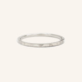 Into the Tidal Wave Hammered Flat Band