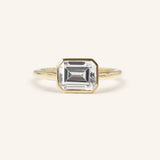 Hidden Bezel Emerald Cut Moissanite Solitaire East-West Engagement Ring