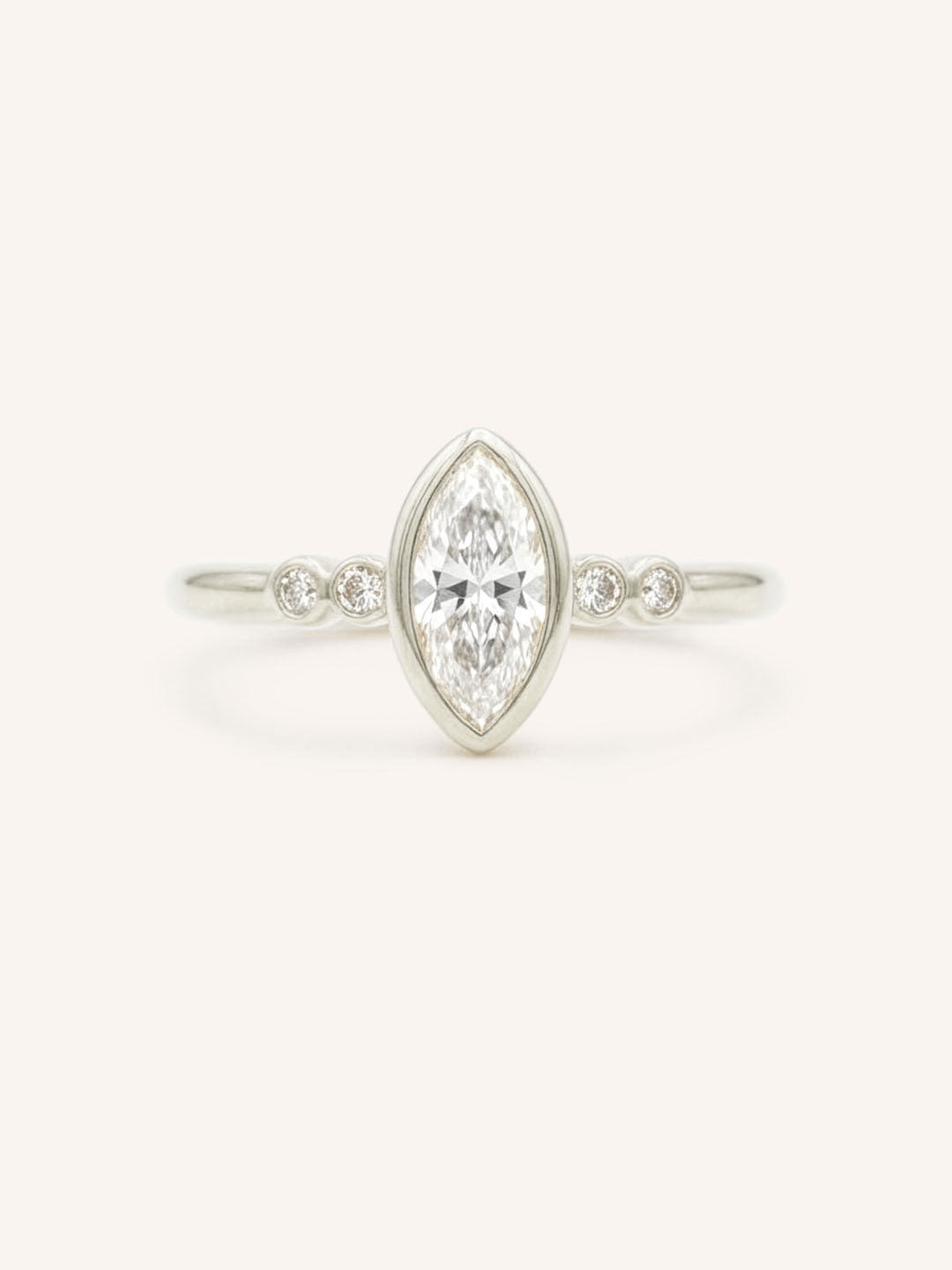 White gold Alameda marquise diamond bezel set engagement ring front view on white background