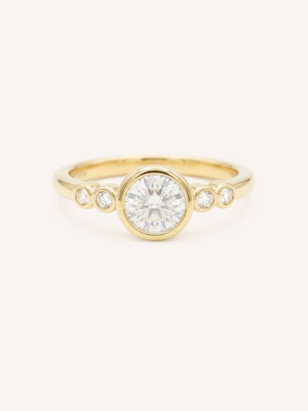 Yellow gold Alameda round diamond bezel set engagement ring front view on white background