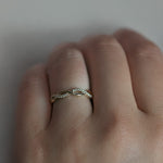Interwoven Diamond Wedding Ring lifestyle photo worn on hand