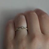 Interwoven Diamond Wedding Ring lifestyle photo worn on hand