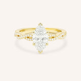 Yellow Gold Levana Marquise Diamond Twist Accented Engagement Ring front view on white background