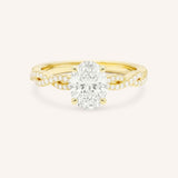 Yellow Gold Levana Oval Diamond Twist Accented Engagement Ring front view on white background
