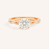 Rose Gold Levana Round Diamond Twist Accented Engagement Ring front view on white background