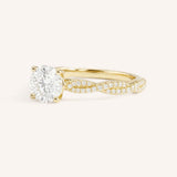 Yellow Gold Levana Round Diamond Twist Accented Engagement Ring side view on white background