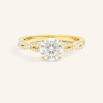 Yellow Gold Levana Round Diamond Twist Accented Engagement Ring front view on white background
