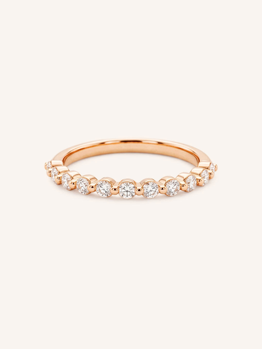 Rose gold Maisi round diamond eternity wedding ring, front view, on white background