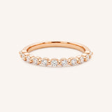 Rose gold Maisi round diamond eternity wedding ring, front view, on white background