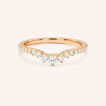 Rose gold ring with diamonds on a white background