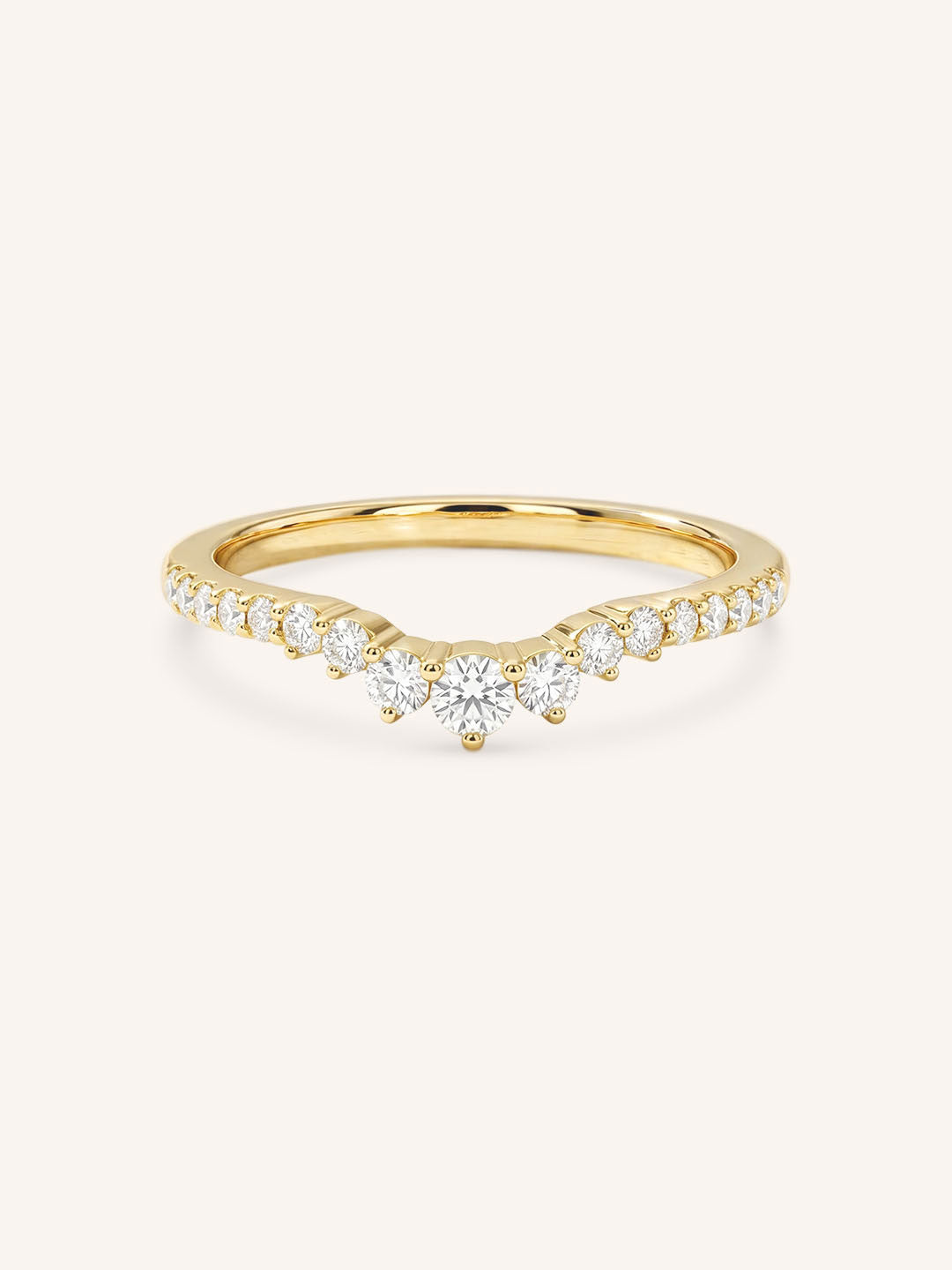 Yellow gold Whitney curved diamond wedding band front view on white background