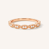 Rose gold Loubet milgrain diamond wedding band front view on white background