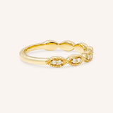 Yellow gold Loubet milgrain diamond wedding band side view on white background