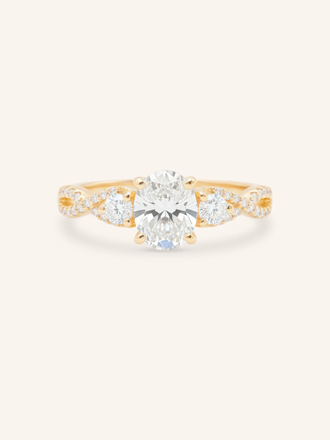 Rose gold Lindey oval three stone diamond engagement ring front view on white background