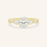 Yellow gold Lindey oval three stone diamond engagement ring front view on white background