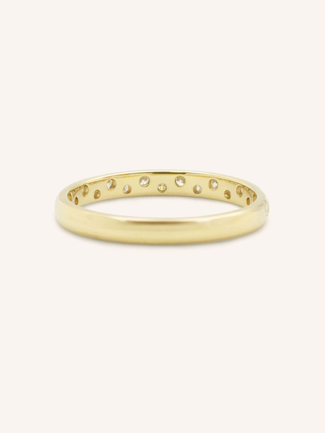 Yellow gold Margot gypsy diamond wedding band back view on white background