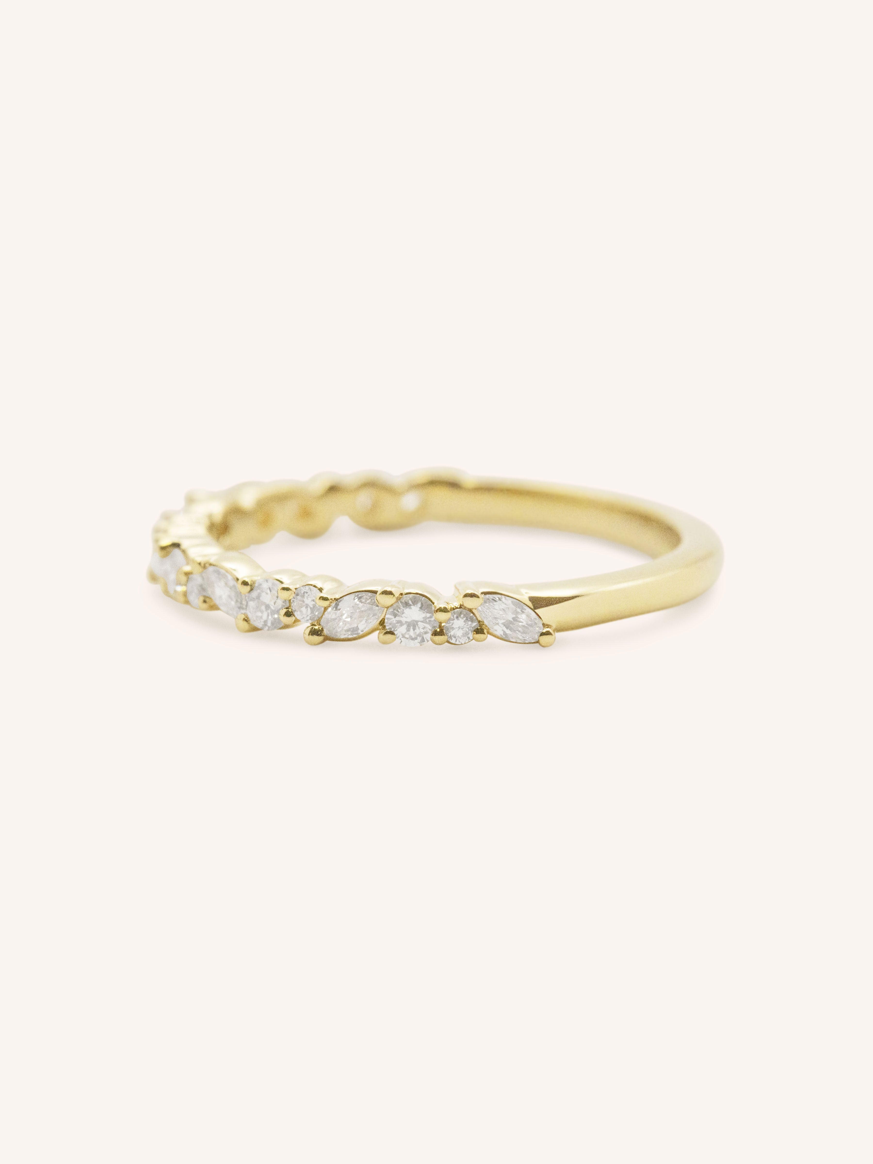 Yellow gold Mandana diamond anniversary band side view on white background