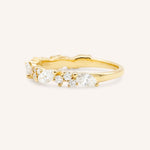 Yellow gold Kamaria diamond anniversary band side view on white background