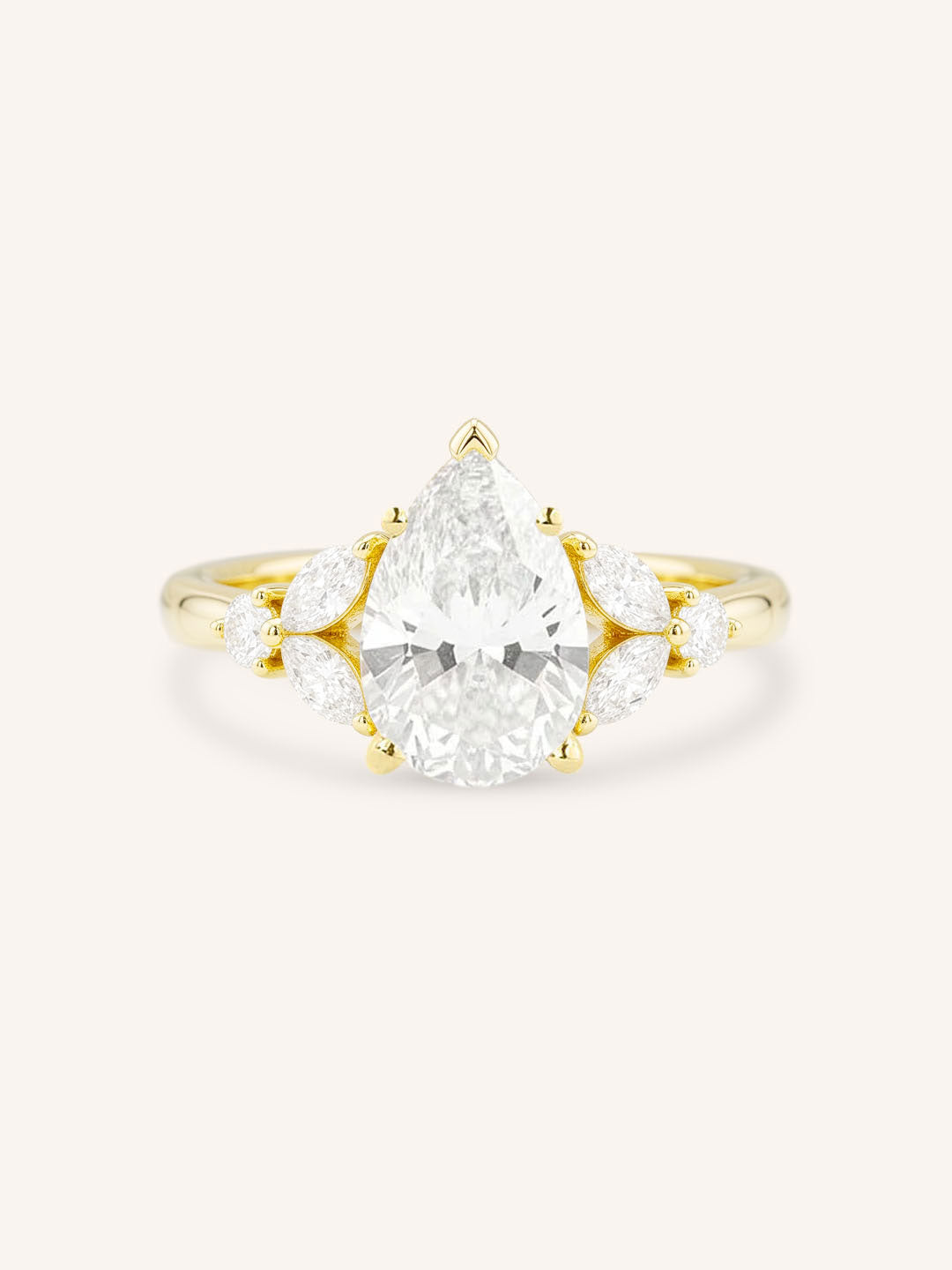 Yellow gold Kyle pear diamond engagement ring front view on white background