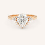 Rose gold Merilyn round diamond cluster engagement ring front view on white background