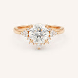 Rose gold Merilyn round diamond cluster engagement ring front view on white background