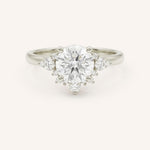 White gold Merilyn round diamond cluster engagement ring front view on white background