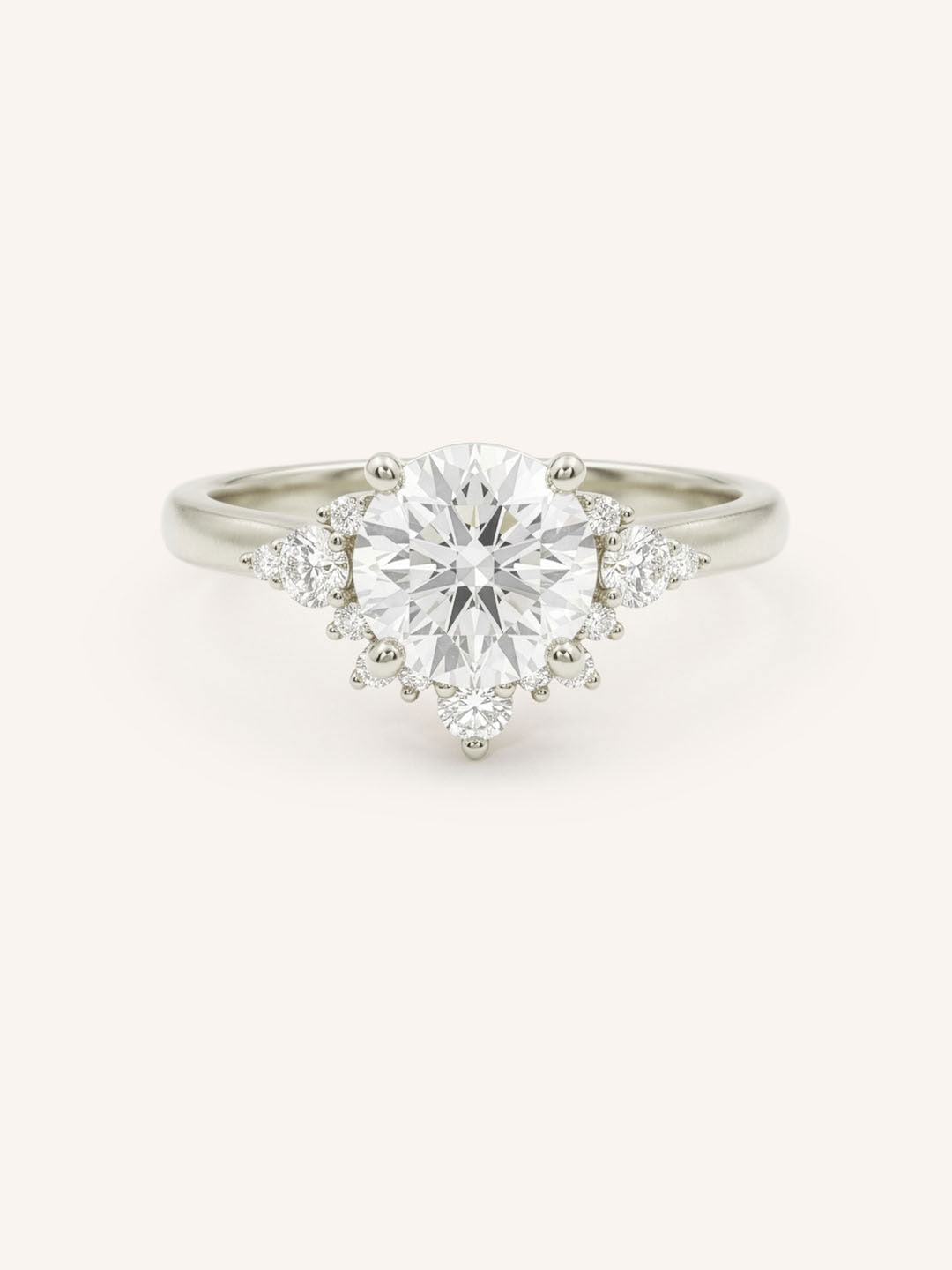 White gold Merilyn round diamond cluster engagement ring front view on white background