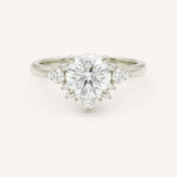 White gold Merilyn round diamond cluster engagement ring front view on white background
