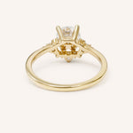 Yellow gold Merilyn round diamond cluster engagement ring back view on white background
