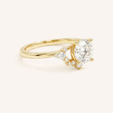 Yellow Gold Merilyn Round Diamond Cluster Engagement Ring side view on white background
