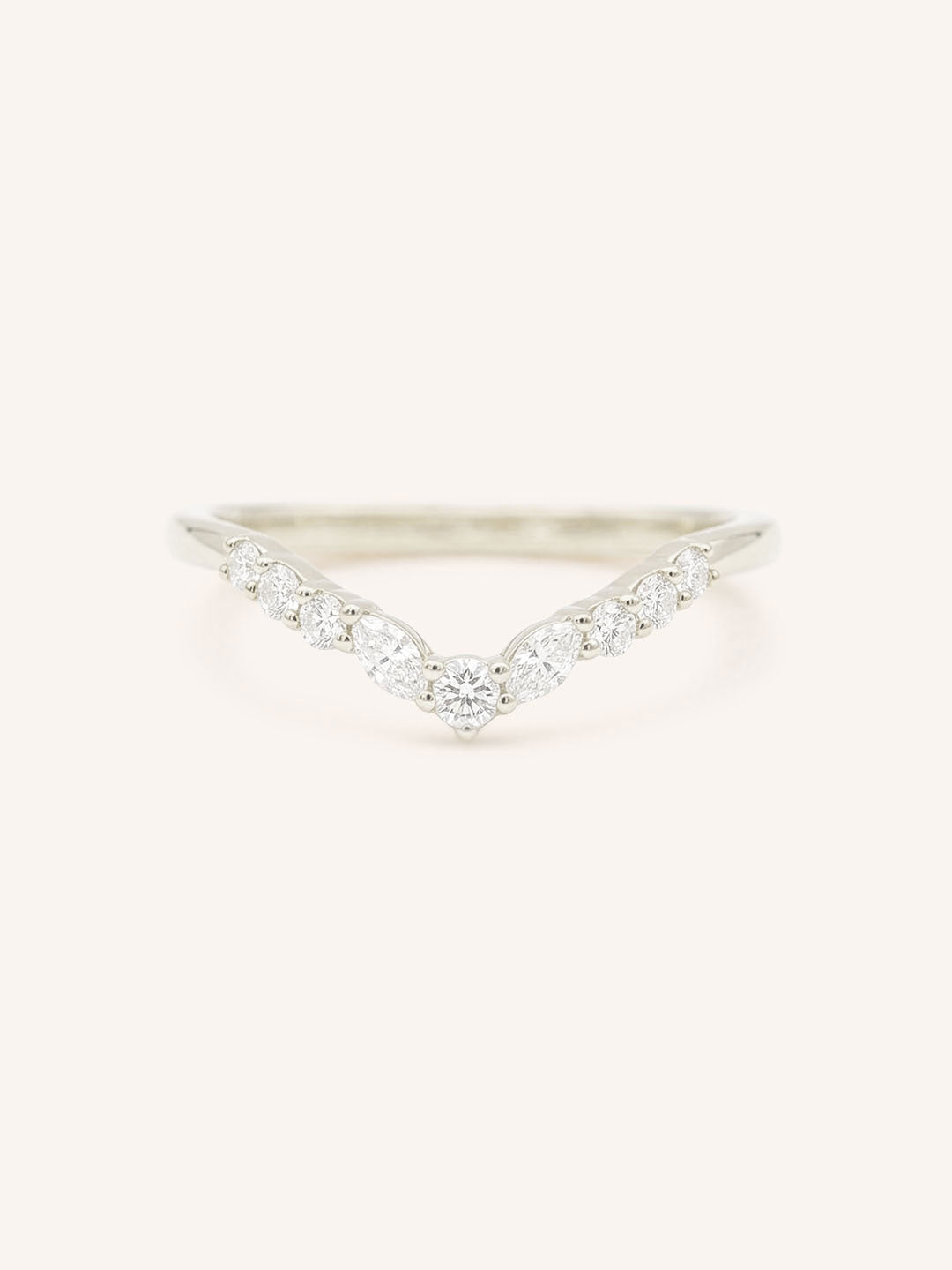 White Gold ring with small diamonds on a white background