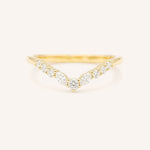 Gold ring with diamonds on a white background