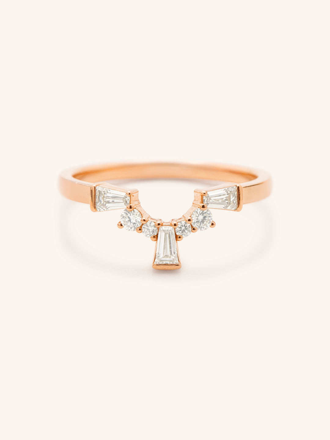 Rose gold Gillespie curved diamond wedding band front view on white background
