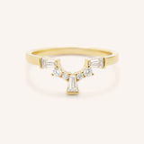 Yellow gold Gillespie curved diamond wedding band front view on white background