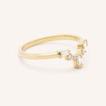 Yellow gold Gillespie curved diamond wedding band side view 1 on white background
