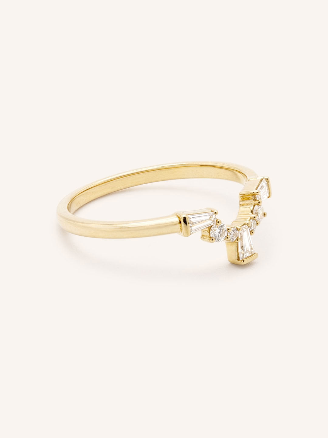 Yellow gold Gillespie curved diamond wedding band side view 1 on white background