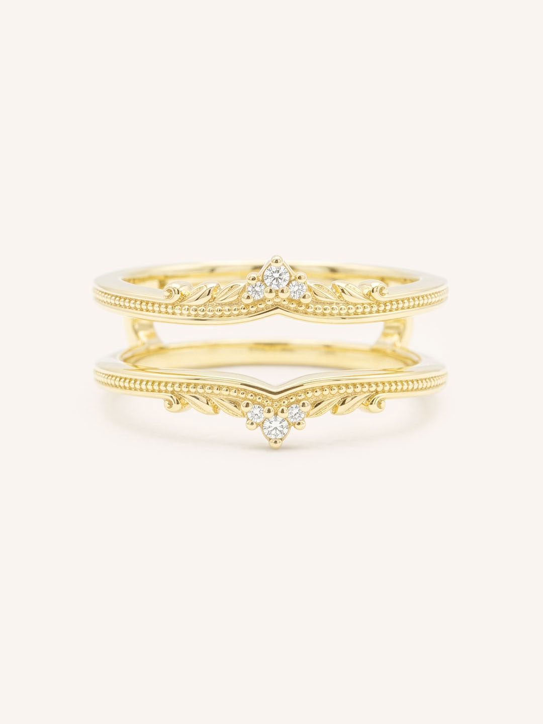 Yellow gold Junelli diamond milgrain ring guard front view on white background