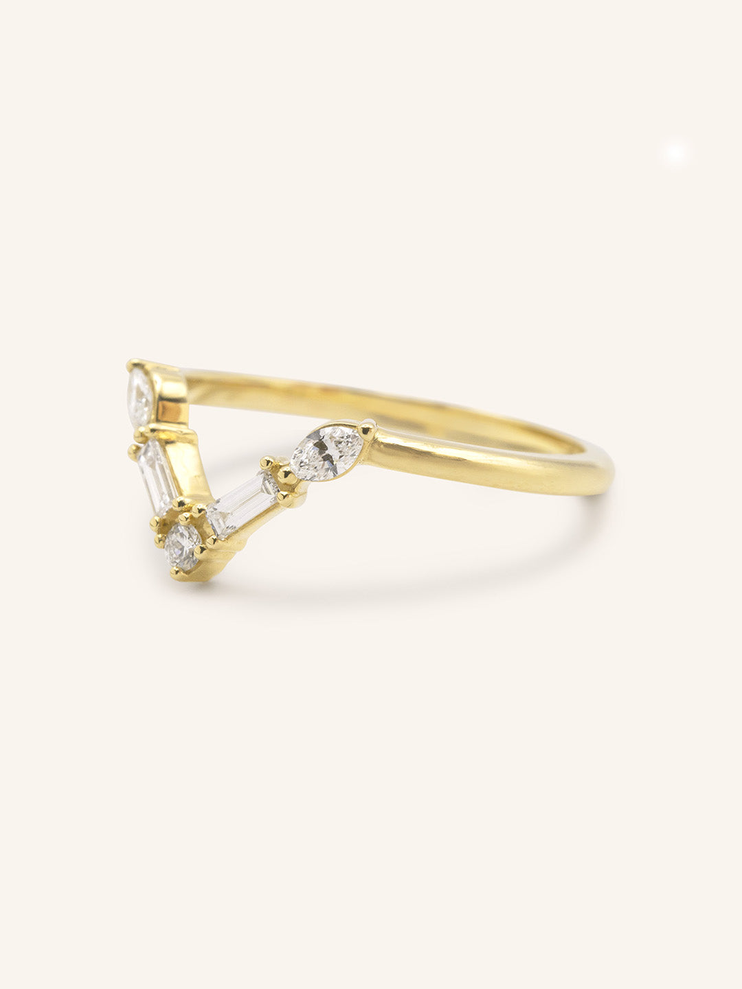 Yellow gold Rosalina V diamond wedding band side view on white background