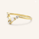 Yellow gold Rosalina V diamond wedding band side view on white background